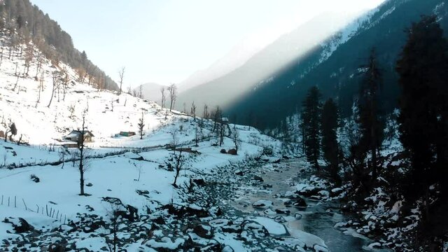 Lidder river in Phalgam valley in Kashmir region  of India, shot this during the sunrise from the back of the snow capped mountains.