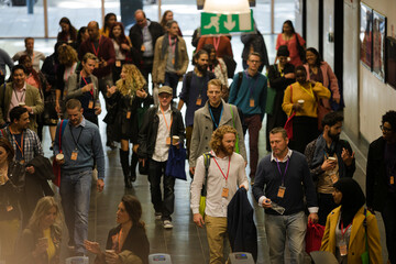 People arriving at  conference