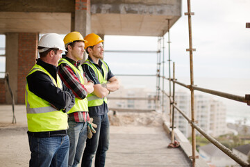 Construction workers at highrise construction site