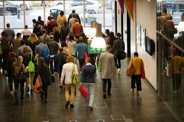 People leaving conference hall