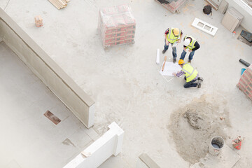 Overhead view of construction workers at construction site