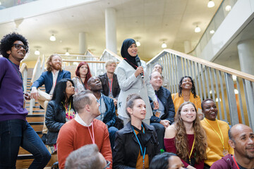 Woman in audience asking question