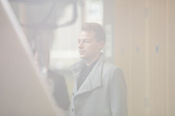 Fototapeta premium Man waiting in hall of auditorium