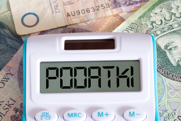 Banknoten Polnische Zloty PLN, Taschenrechner und Steuern in Polen