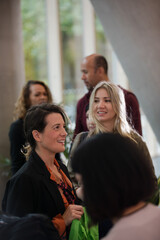 People waiting in hall of auditorium