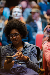 Audience using camera phones