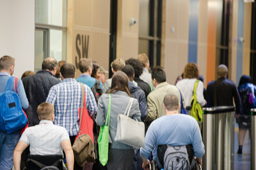 Fototapeta premium People entering auditorium