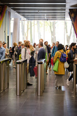 People entering auditorium hallway