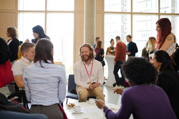 Speaker talking with audience