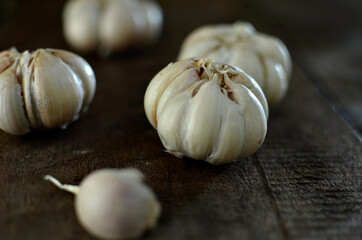 Bunch of fresh garlic on the wooden table