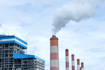 The heat from the chimneys of a coal-fired power plant