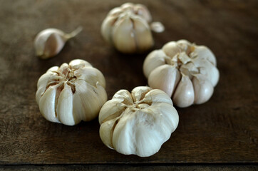 Bunch of fresh garlic on the wooden table