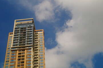 Blue sky, white clouds and buildings