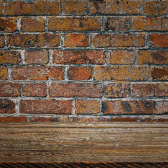The background is blank wooden boards and a textured brick wall with lighting and vignetting.