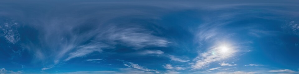 Obraz premium Blue sky panorama with Cirrus clouds. Seamless hdr 360 degree pano in spherical equirectangular format. Complete zenith for 3D visualization, game and sky replacement for aerial drone 360 panoramas.