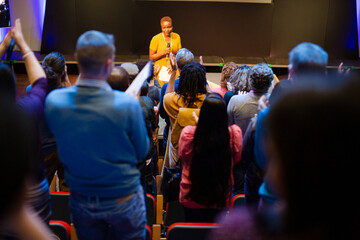Enthusiastic audience clapping