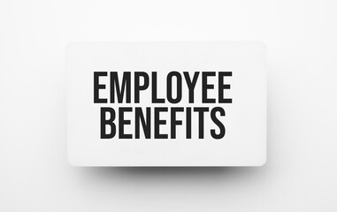 Employee Benefits sign on notepad on the white backgound