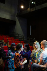 Audience talking to speaker in wheelchairs on stage