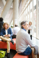 People waiting during conference break