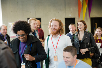 People walking in auditorium hall