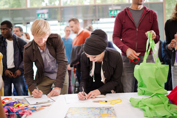 People signing up for conference