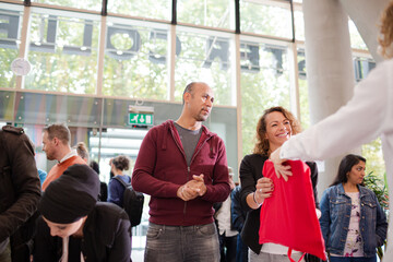 Obraz premium People signing up for conference