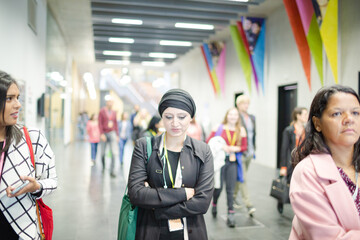 People arriving at conference