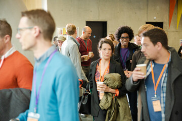 People walking in auditorium hall