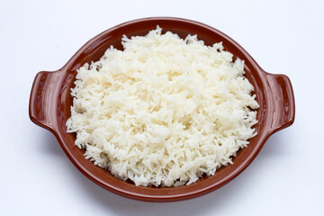 Dish of rice on white background.