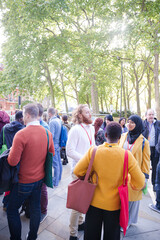 People talking outside auditorium
