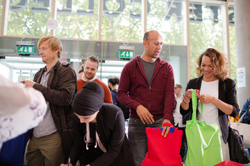 People signing up for conference