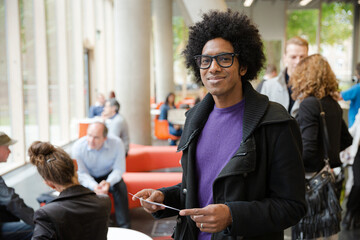 Portrait of man in auditorium hall