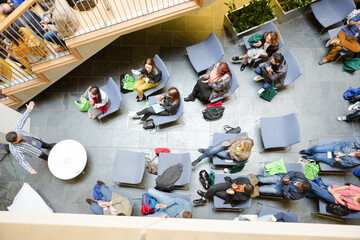 High angle view of people attending conference