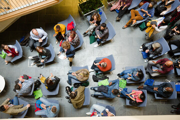 High angle view of people attending conference