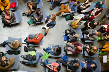 High angle view of people attending conference