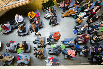 High angle view of people attending conference