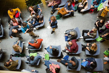 High angle view of people attending conference