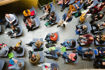 High angle view of people attending conference