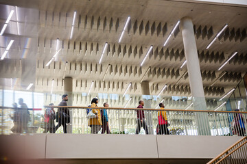 People walking in auditorium hall