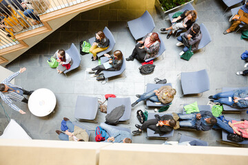 High angle view of people attending conference