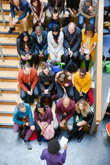 High angle view of people attending conference