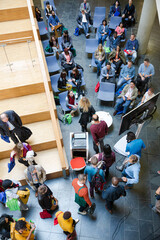 Obraz premium High angle view of people attending conference