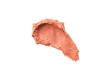 Wet red cosmetic clay smear isolated on white background. Abstract sample of pink cosmetic clay....