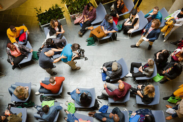 Fototapeta premium High angle view of people attending conference