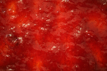 Background of red strawberry jam