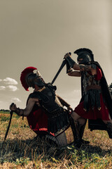 Battle with swords between two ancient warriors.