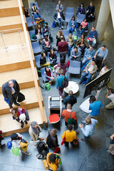 Obraz premium High angle view of people attending conference