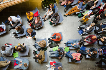 High angle view of people attending conference