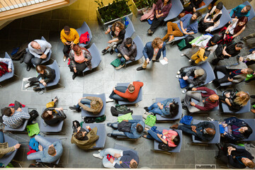 High angle view of people attending conference