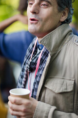 Businessman talking during conference break